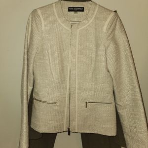 Karl lagerfeld gold zippers in woven sunset under tone to a vanilla weave.